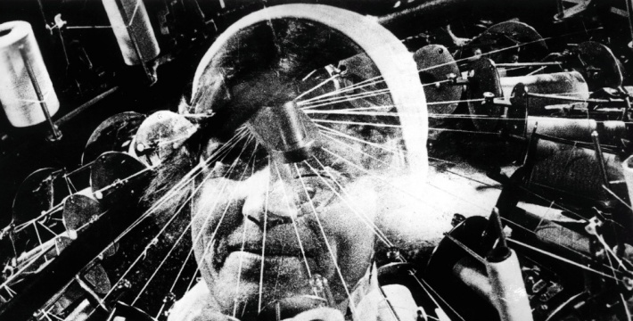 man-with-a-movie-camera-1929-003-head-superimposed-on-sewing-machine-1000x750